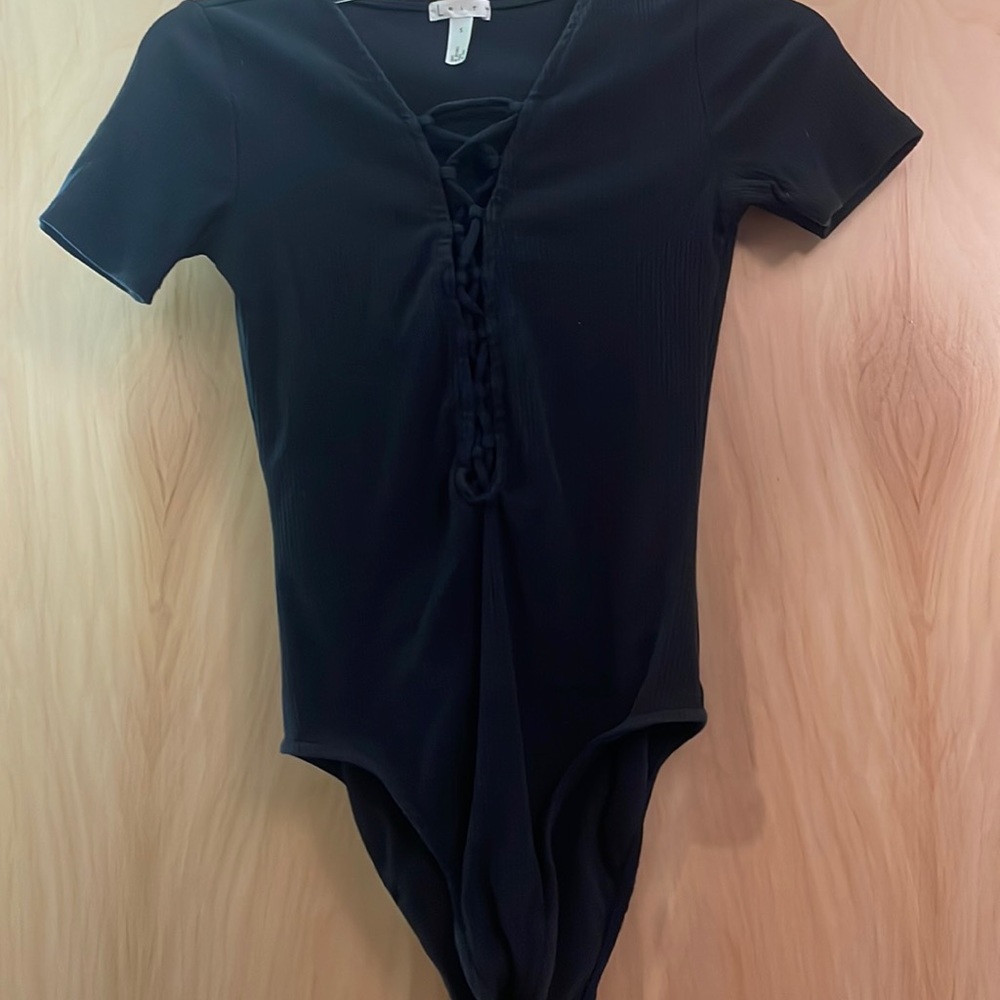 Brand: leith. Size small. Black Bodysuite. Stretchy material. Worn a few times